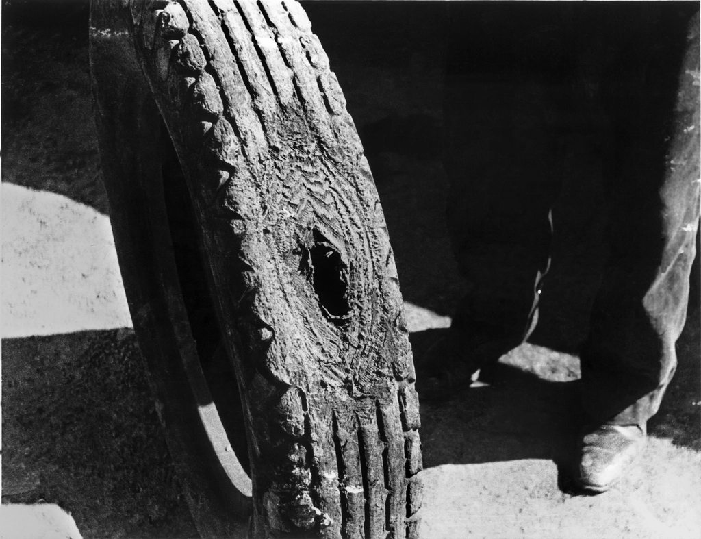 Worn tire tread closeup — when the tread wears down, it's time to compare tire prices